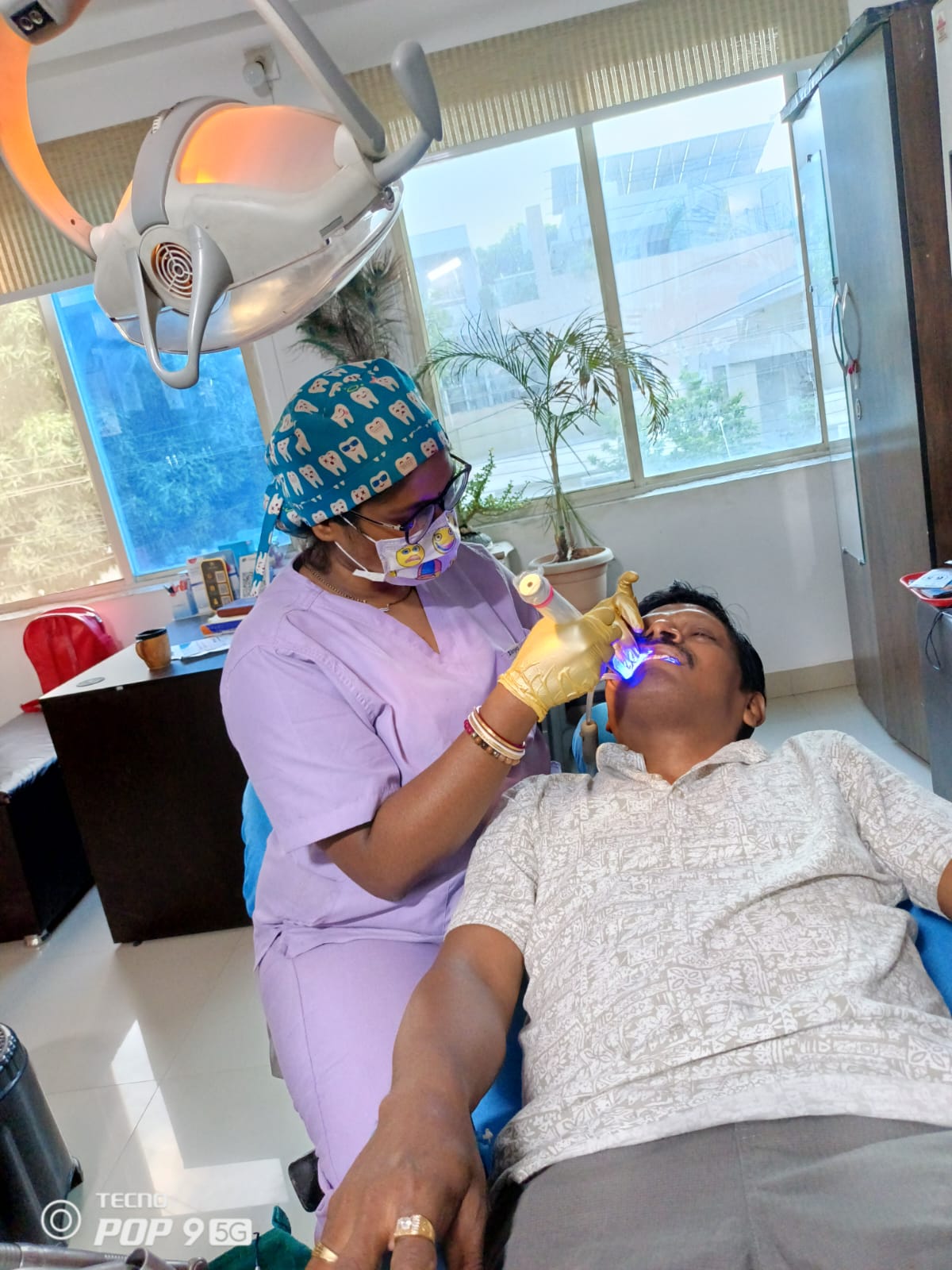 Dr. Papia Das treating a patient