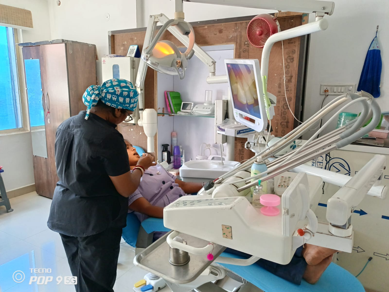 Dr. Papia Das treating a patient